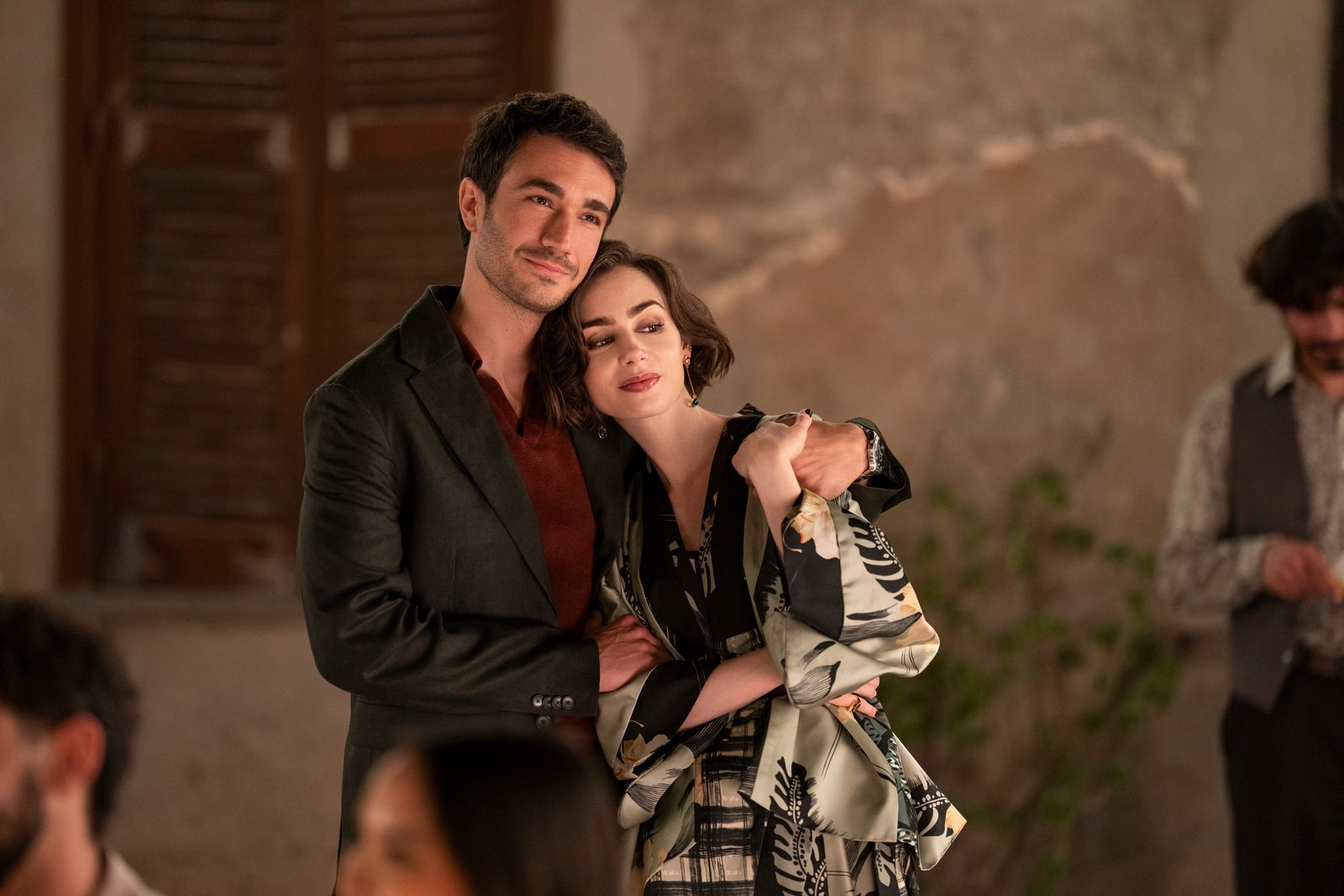Image may contain Philip McGinley Lily Collins Face Happy Head Person Smile Blazer Clothing Coat Jack and adult