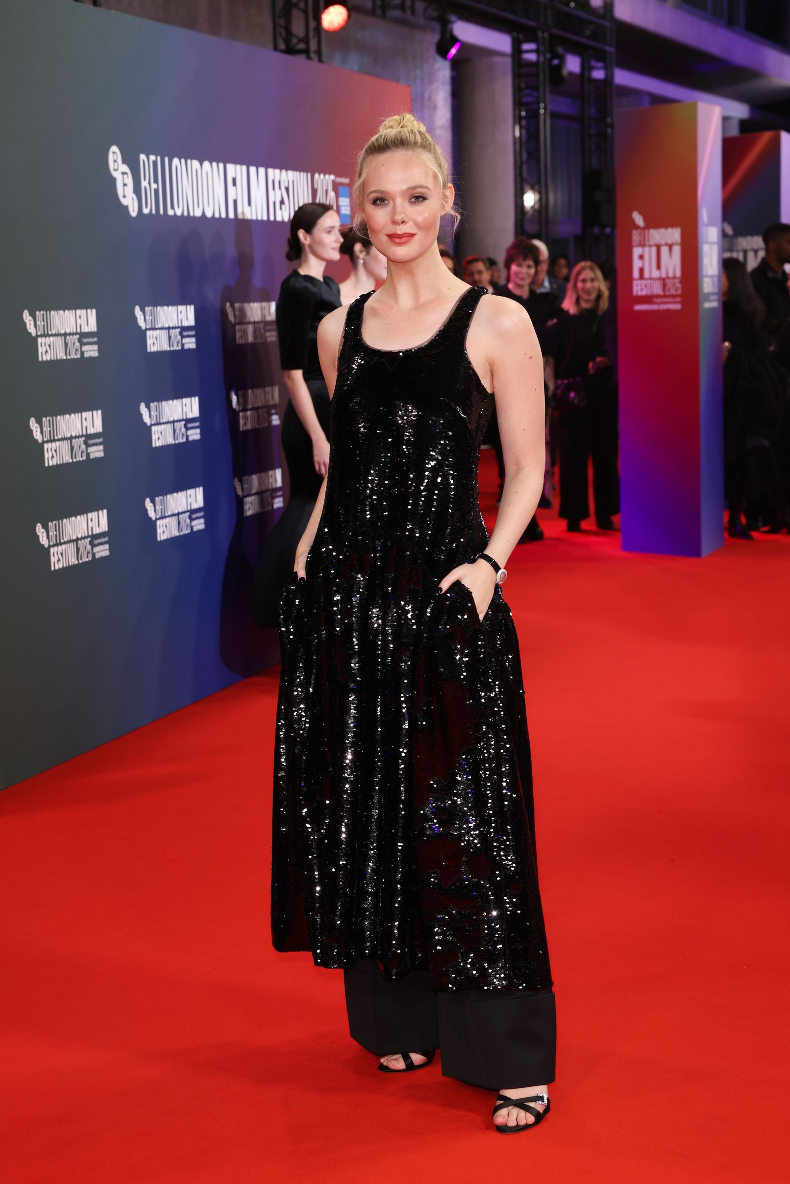 Image may contain Elle Fanning Rachel Brosnahan Carrie Perrodo Fashion Adult Premiere and Red Carpet