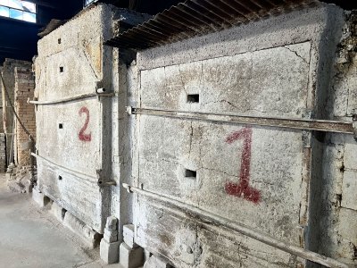 View of two crucibles in a foundry. 
