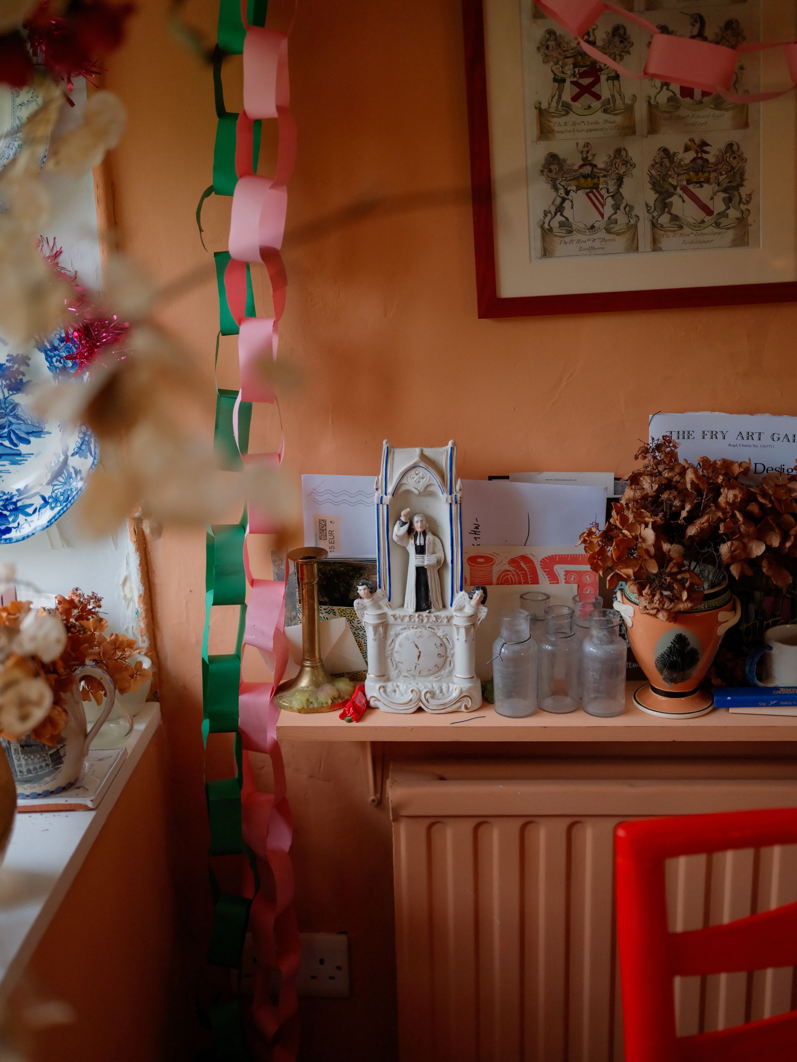 Pictures may contain plants, potted plants, jars, pottery, vases, dressing rooms, indoor dining tables, furniture and tables.