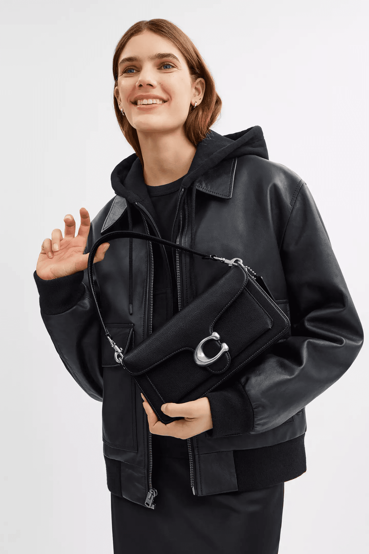 Image may contain Ysica Toscanini clothing coat jacket long sleeves and sleeves