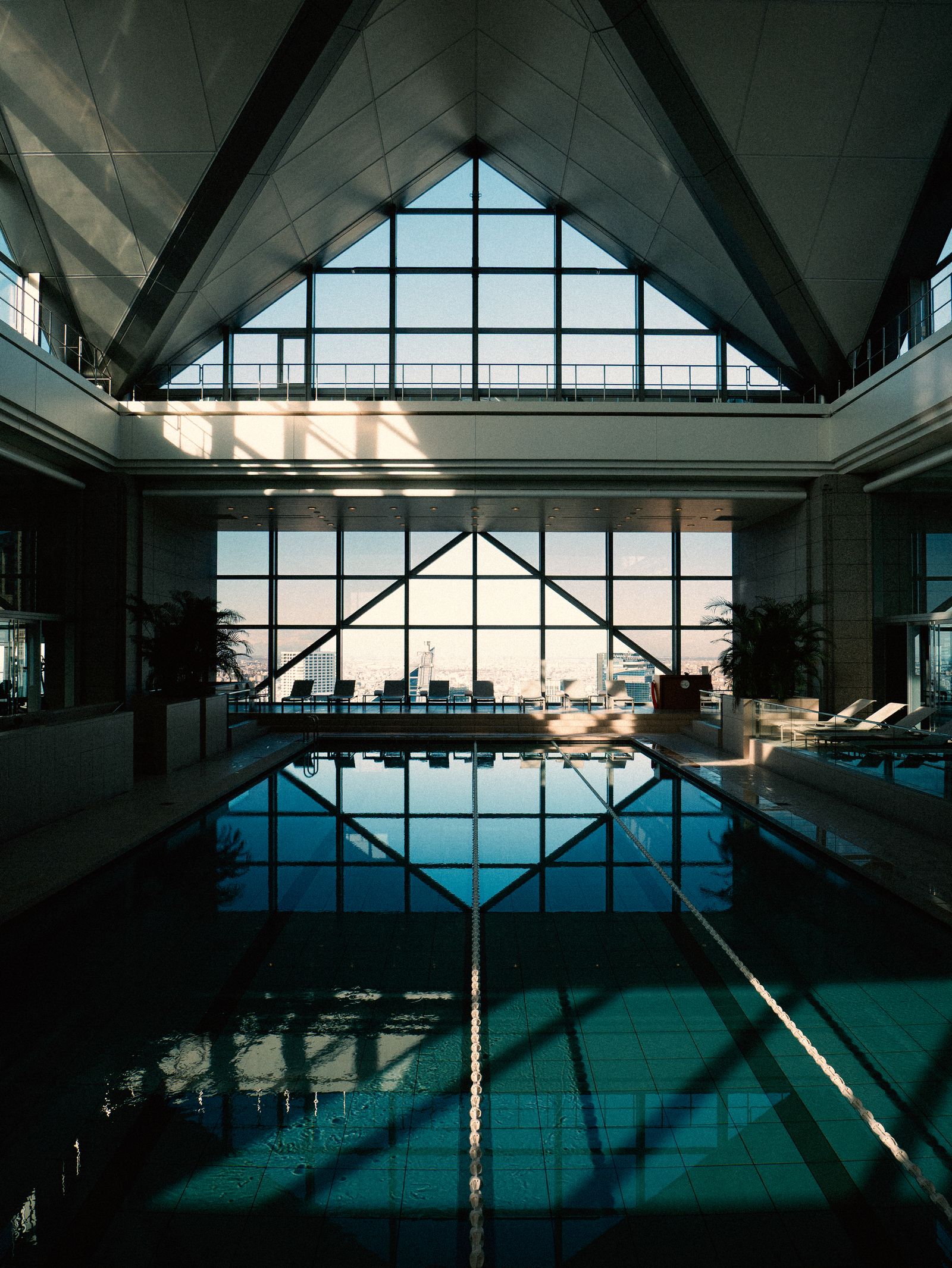 Image may contain swimming pool, water, building, swimming pool, floor, office building, windows, hotels and resorts