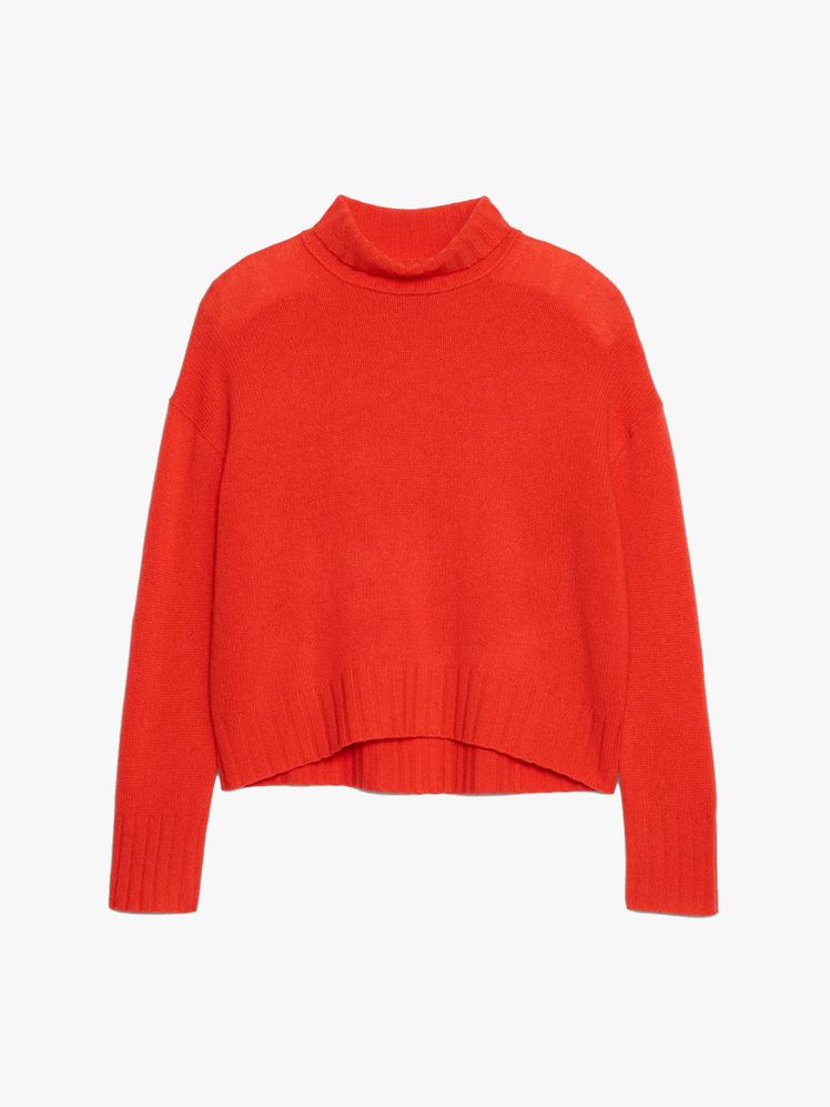 Image may contain: clothes, knitwear, sweaters and sweatshirts