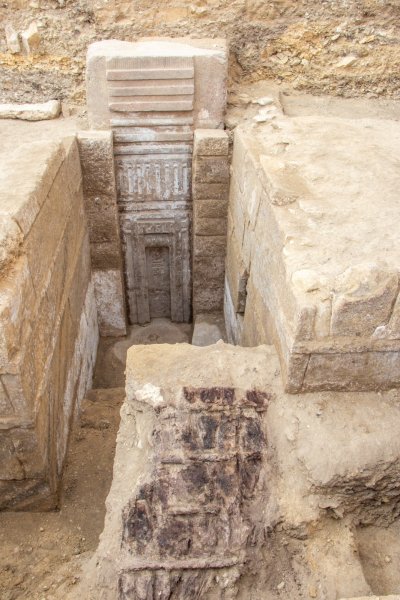 The 15-foot-tall pink granite false door at the tomb of Waserif Re in Saqqara, Egypt.