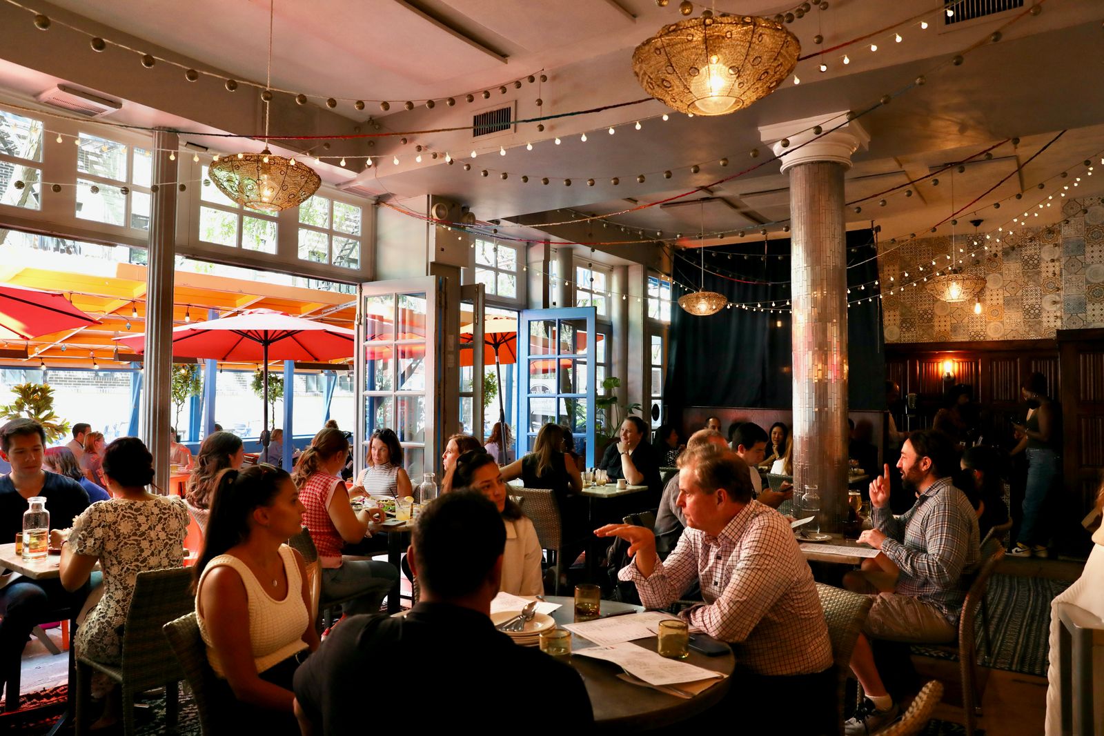 Image may contain Shim Hyejin indoor restaurant adult city cafe cafeteria architecture and architecture