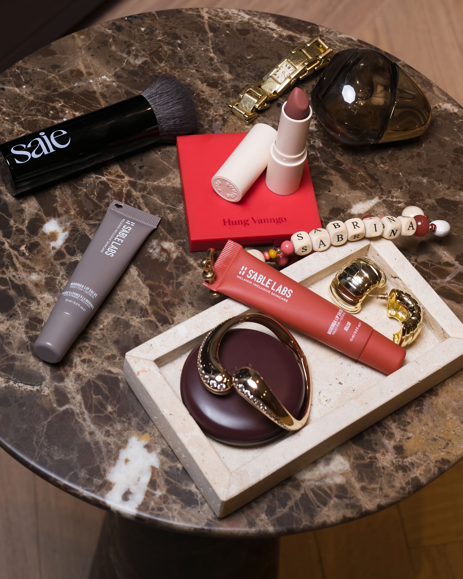 Images may contain makeup, brushes, tools, lipstick, mortars, cases and weapons