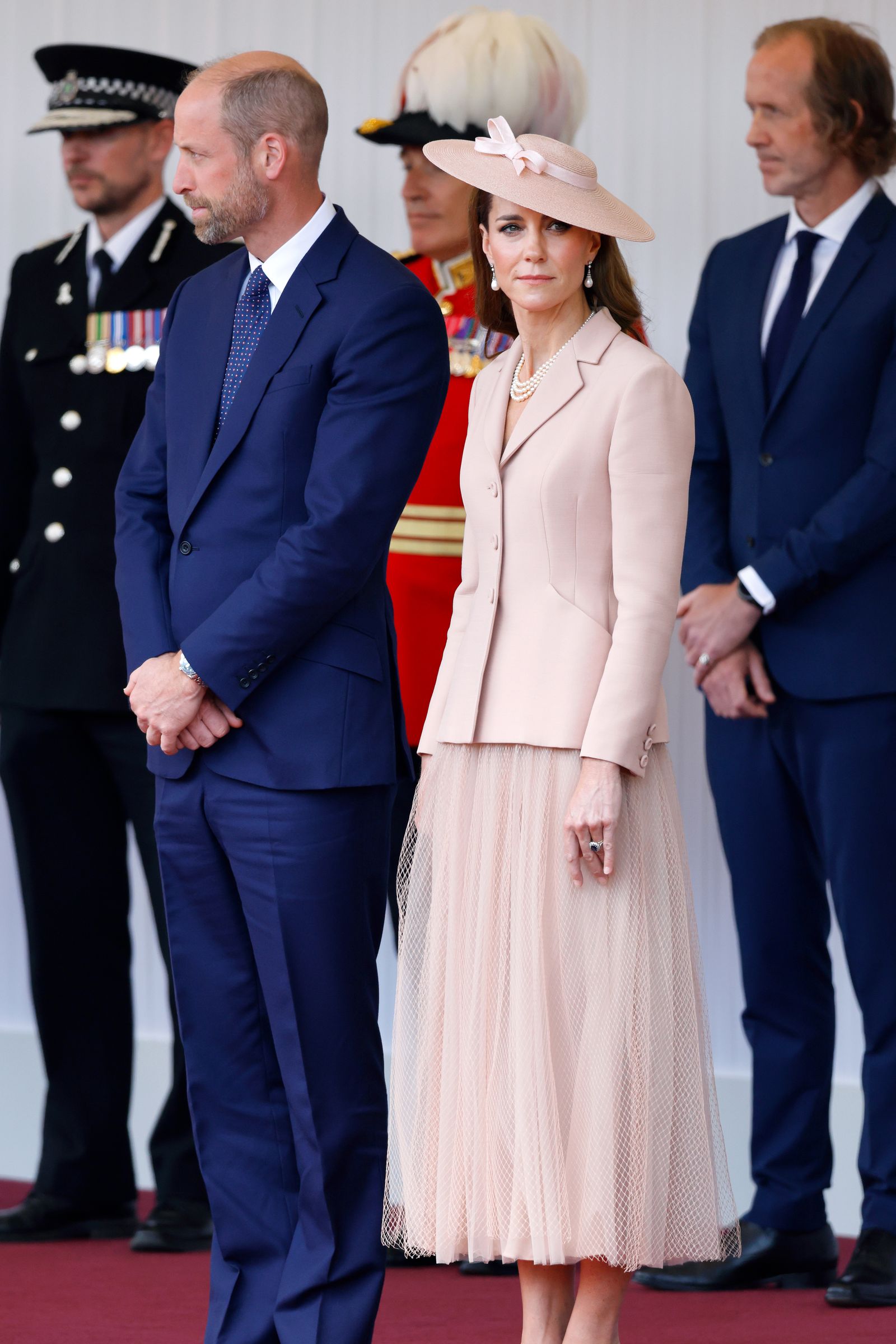 Image may contain Prince William, Duke of Cambridge, Petr Plack, People Adult Officer Accessories Formal Suit and Tie