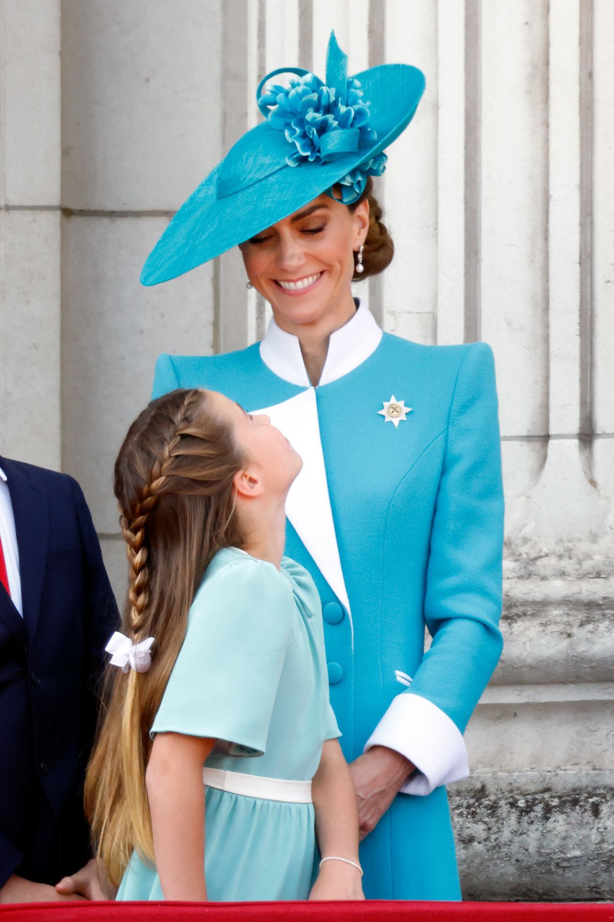 Images may contain people, clothing, formal wear, suits, faces, head shots, portraits and hats