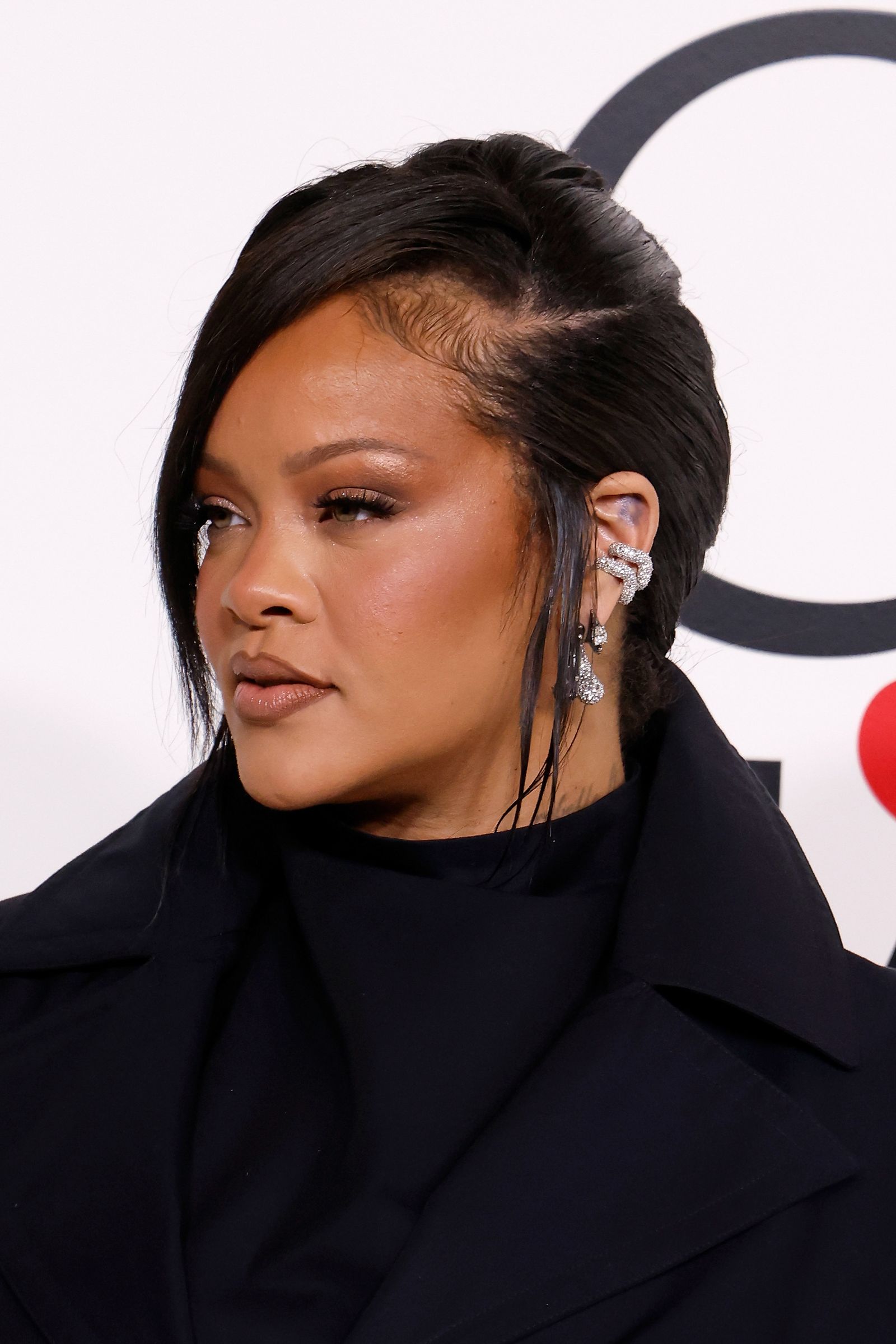 Image may contain Rihanna adult hair and black hair