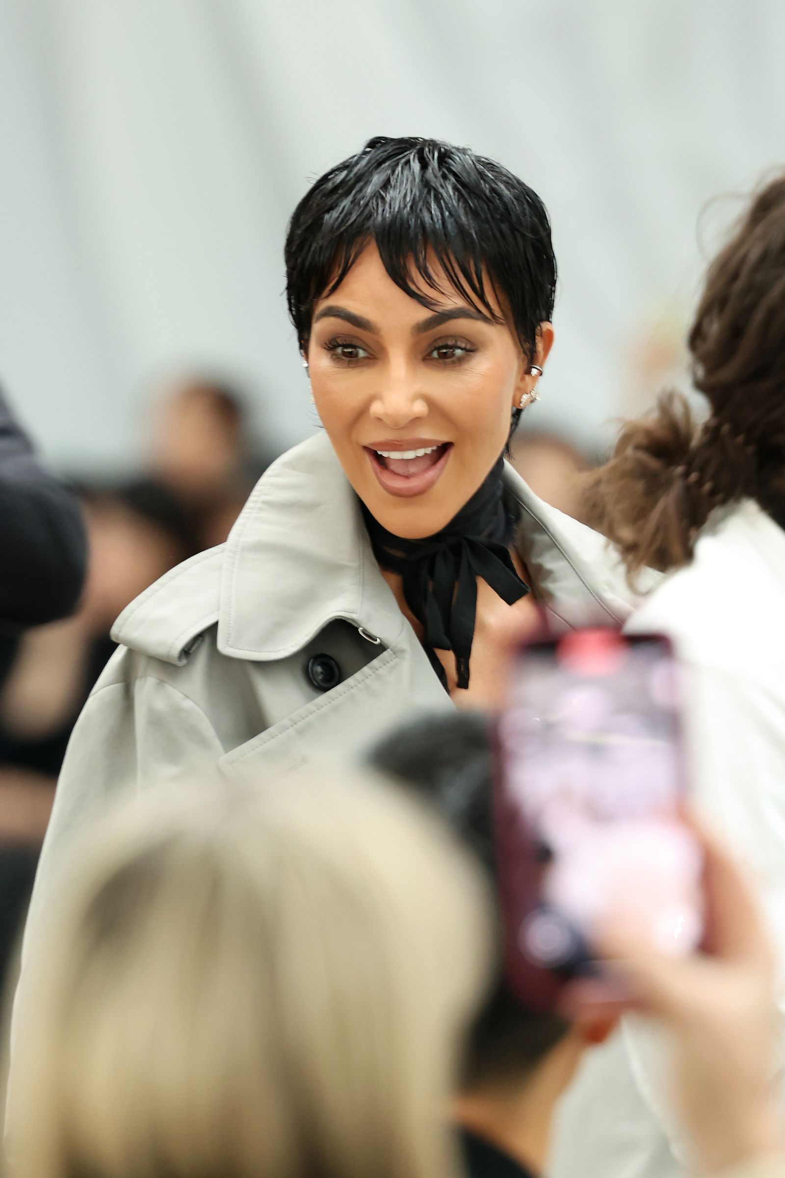 Image may contain Kim Kardashian Black Hair Hair Person Photography Face Happy Head Smile and Adult