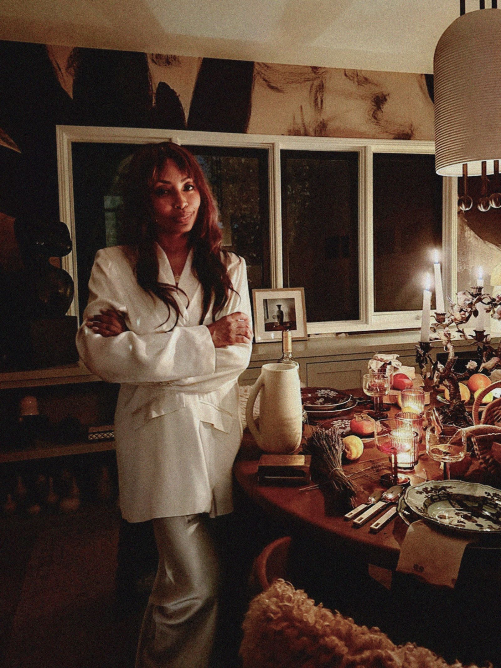 Image may contain architecture, building, restaurant, dining table, furniture, interior, table, face, head and people