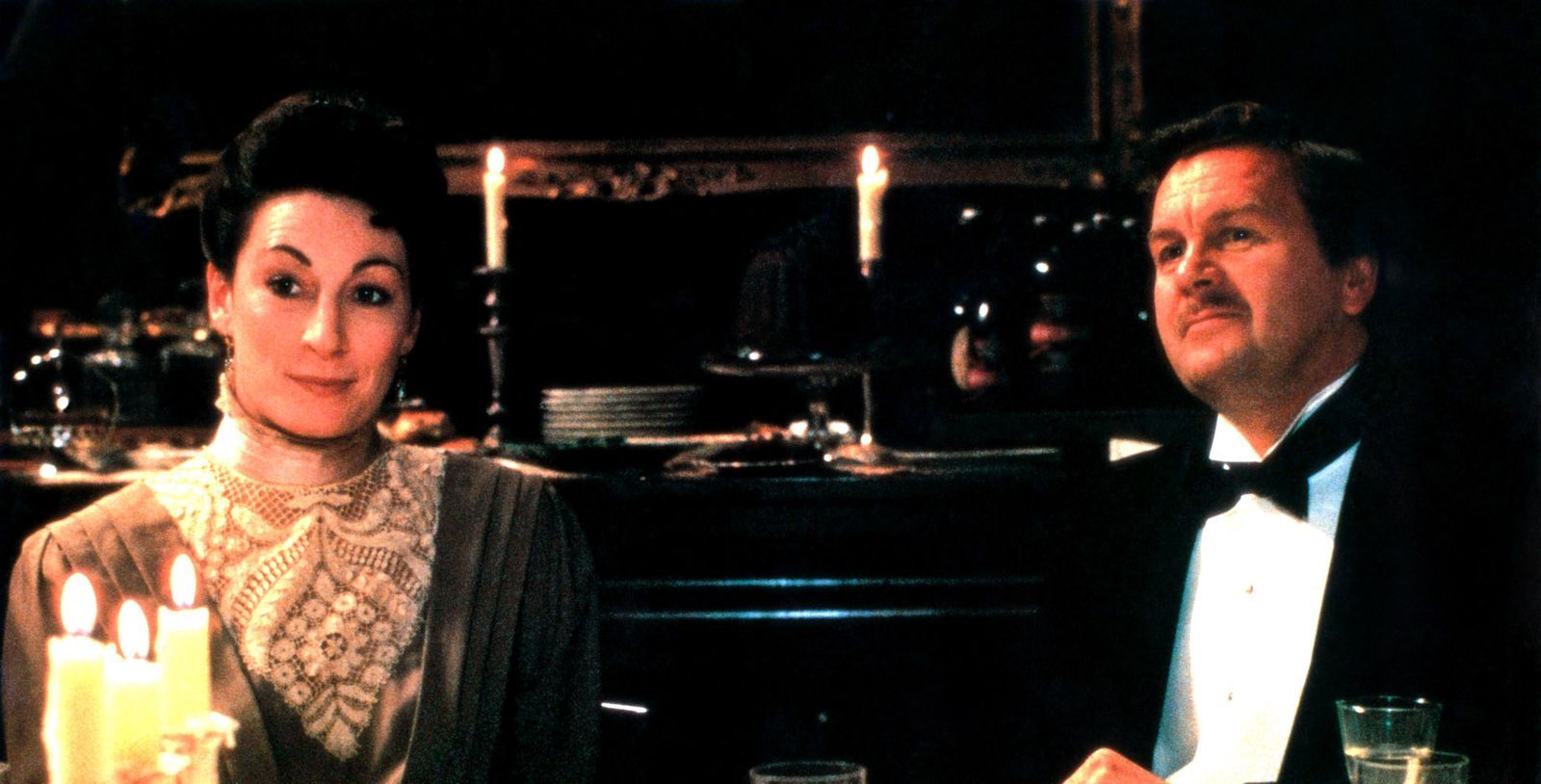 Image may contain Anjelica Huston interiors interior design candles tie accessories accessories and face