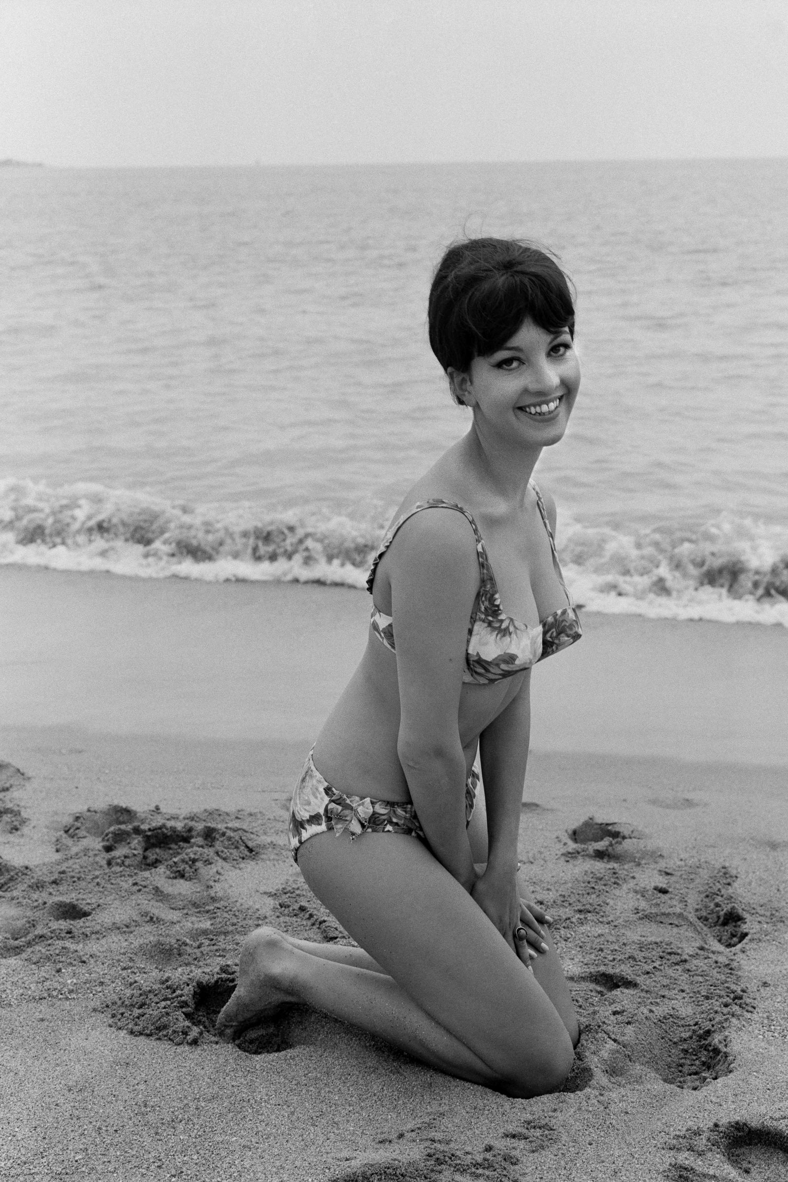 Image may contain Petra Schürmann Clothing Swimwear Face Head People Photography Portraits Bikini Beach and Coast