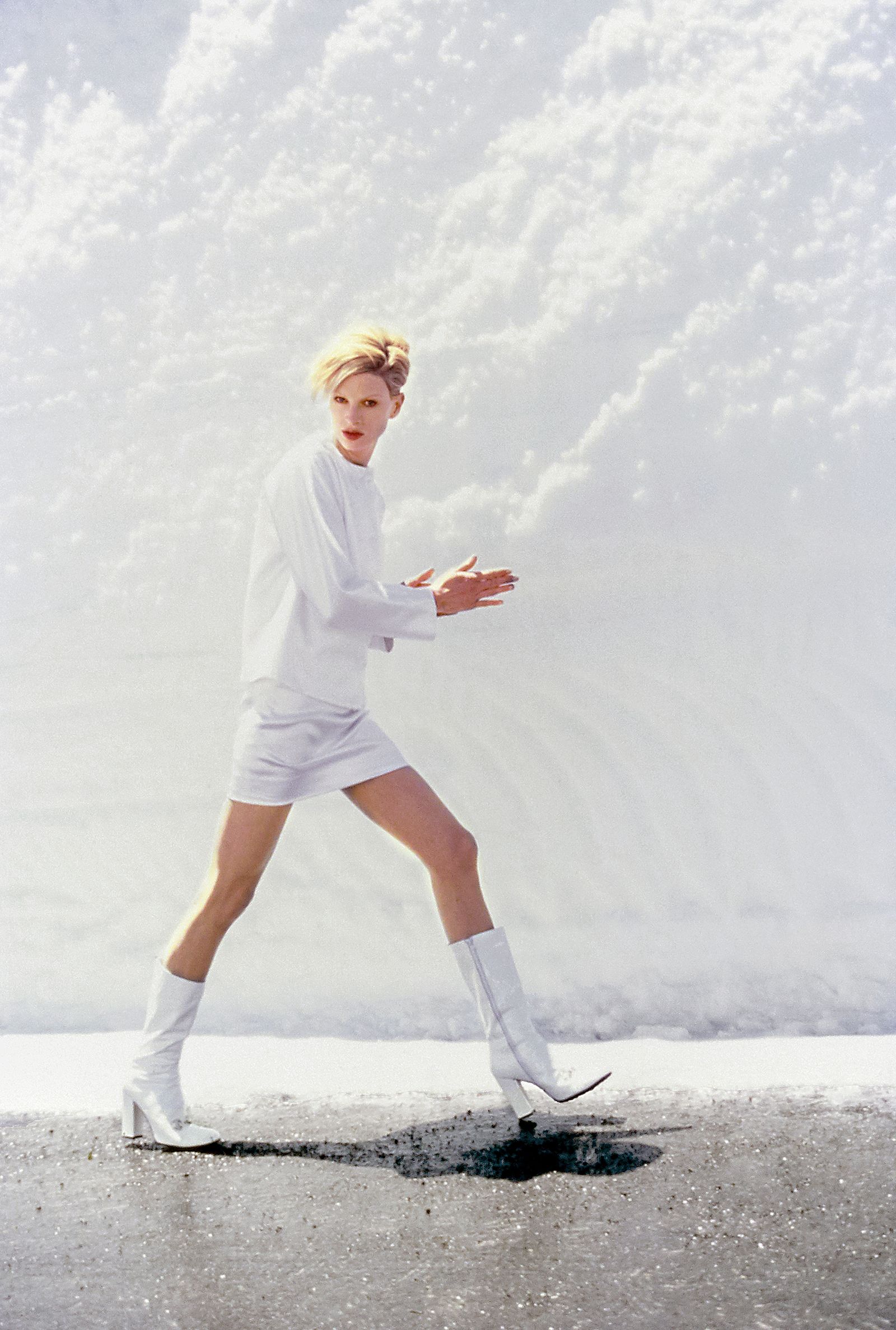 Image may contain Kristen McMenamy teen blonde clothing shoes sneakers shorts and performer