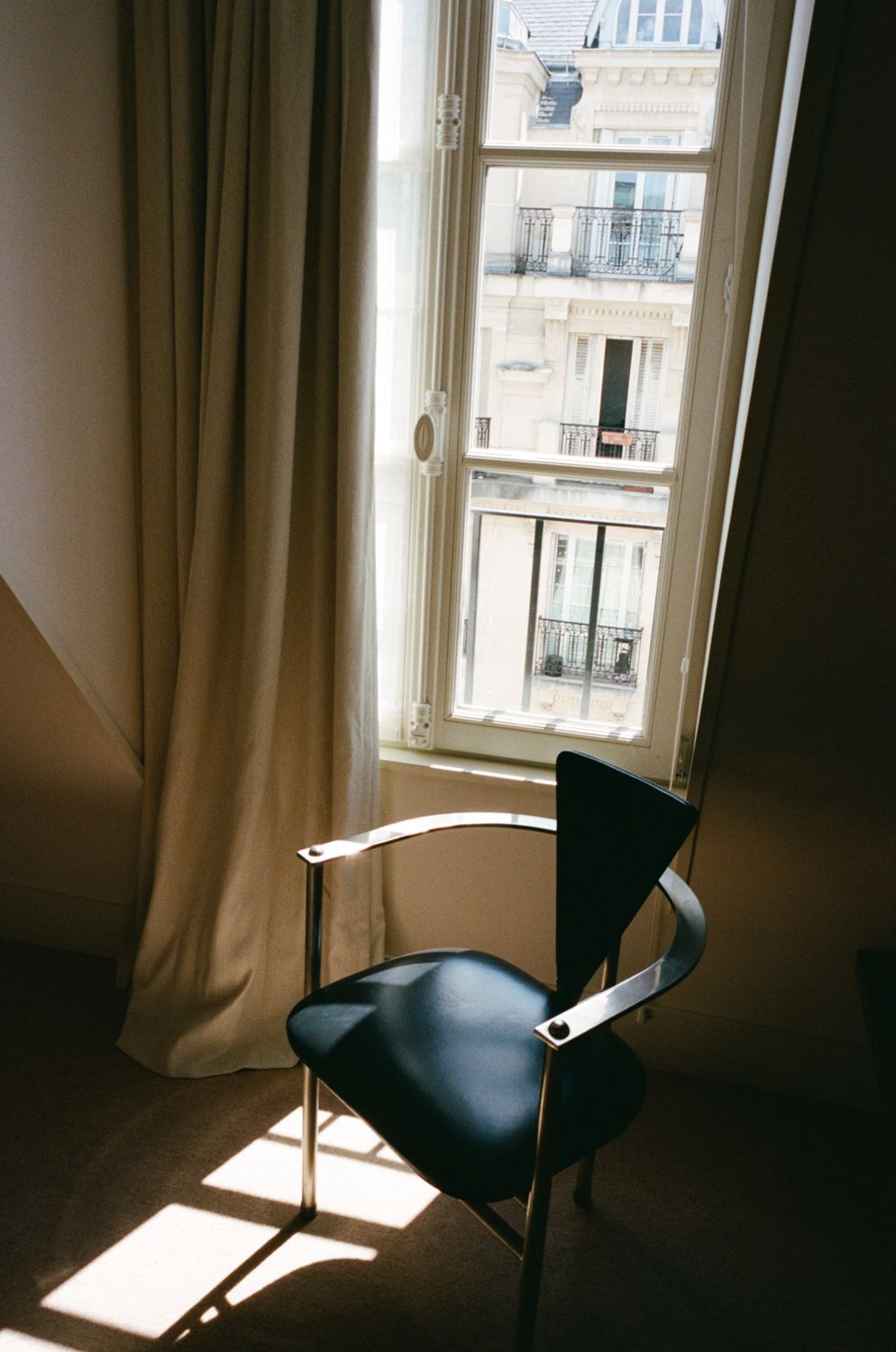 Image may contain chairs, furniture, windows and sills