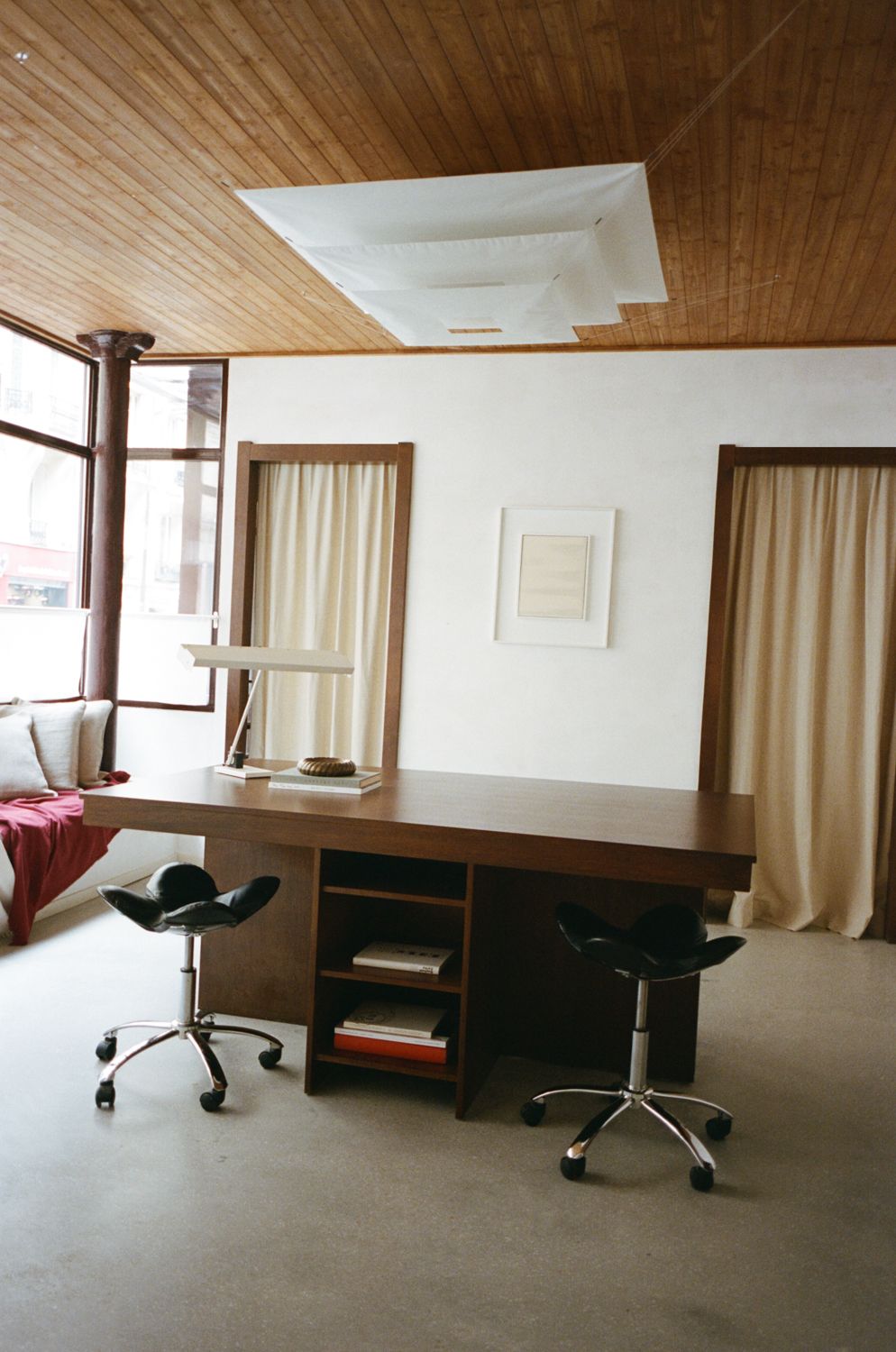 Image may contain interior interior design furniture, table, chairs and wood