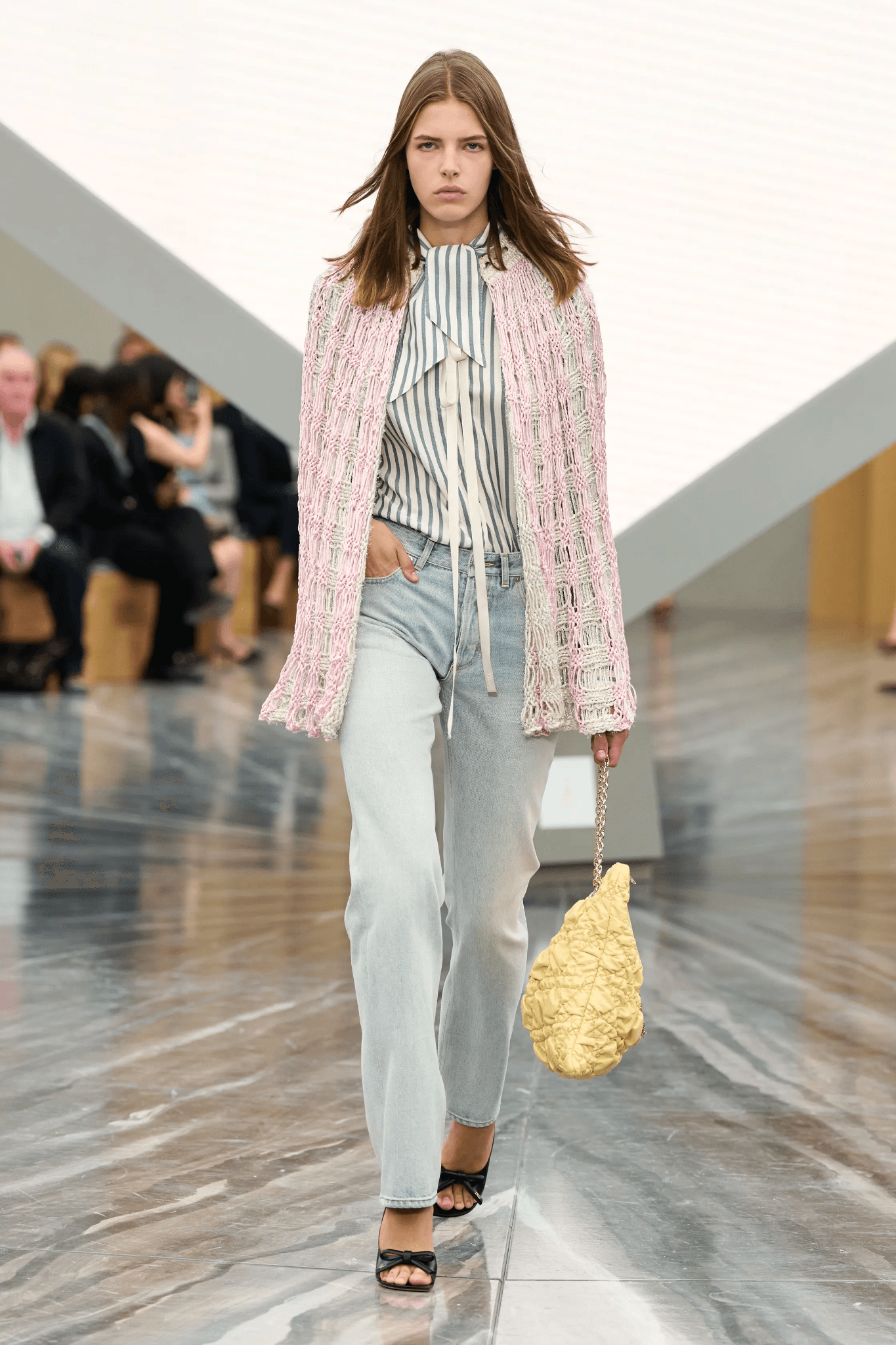 Image may contain clothing, pants, fashion coats, knitwear, sweaters, adult accessories, bags and handbags