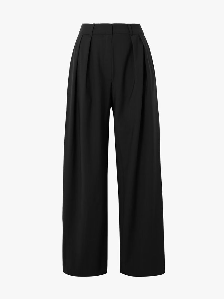 Image may contain: clothes, pants and shorts