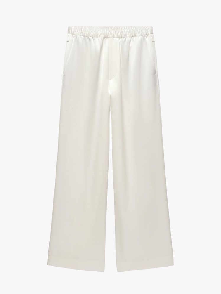 Image may contain: clothes, pants, shorts, home decor and linen