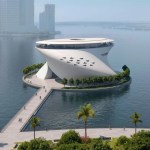 Rendering of a cylindrical museum building on a floating island in a body of water, with its curve extending from upper left to upper right.