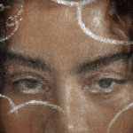 A painting of a woman's eyes.