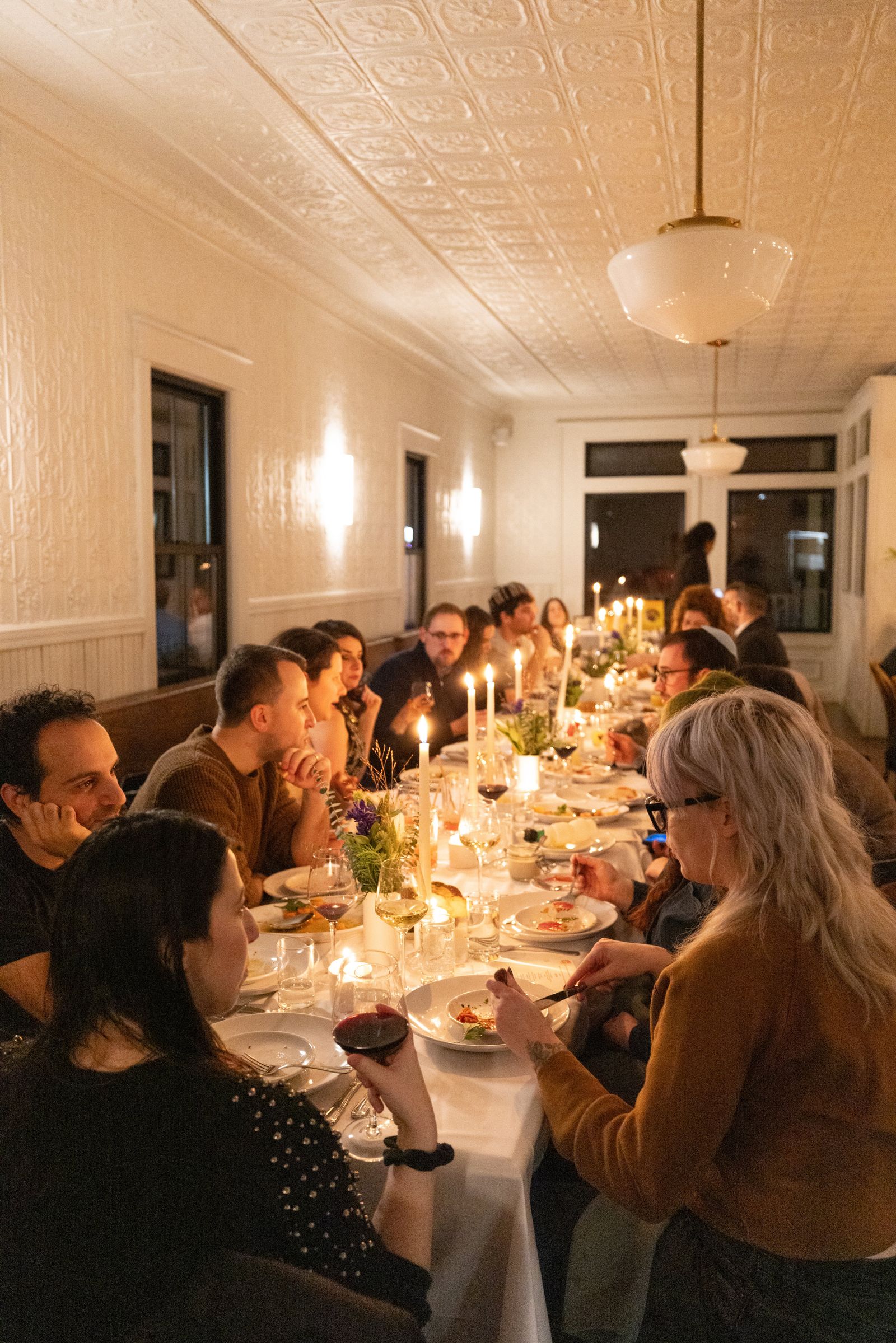 Image may contain Chris Scruggs architecture, architecture, restaurant, dining table, furniture, interior room and table