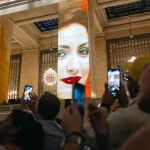 Grand Central Station's Straphanger taking photos of the