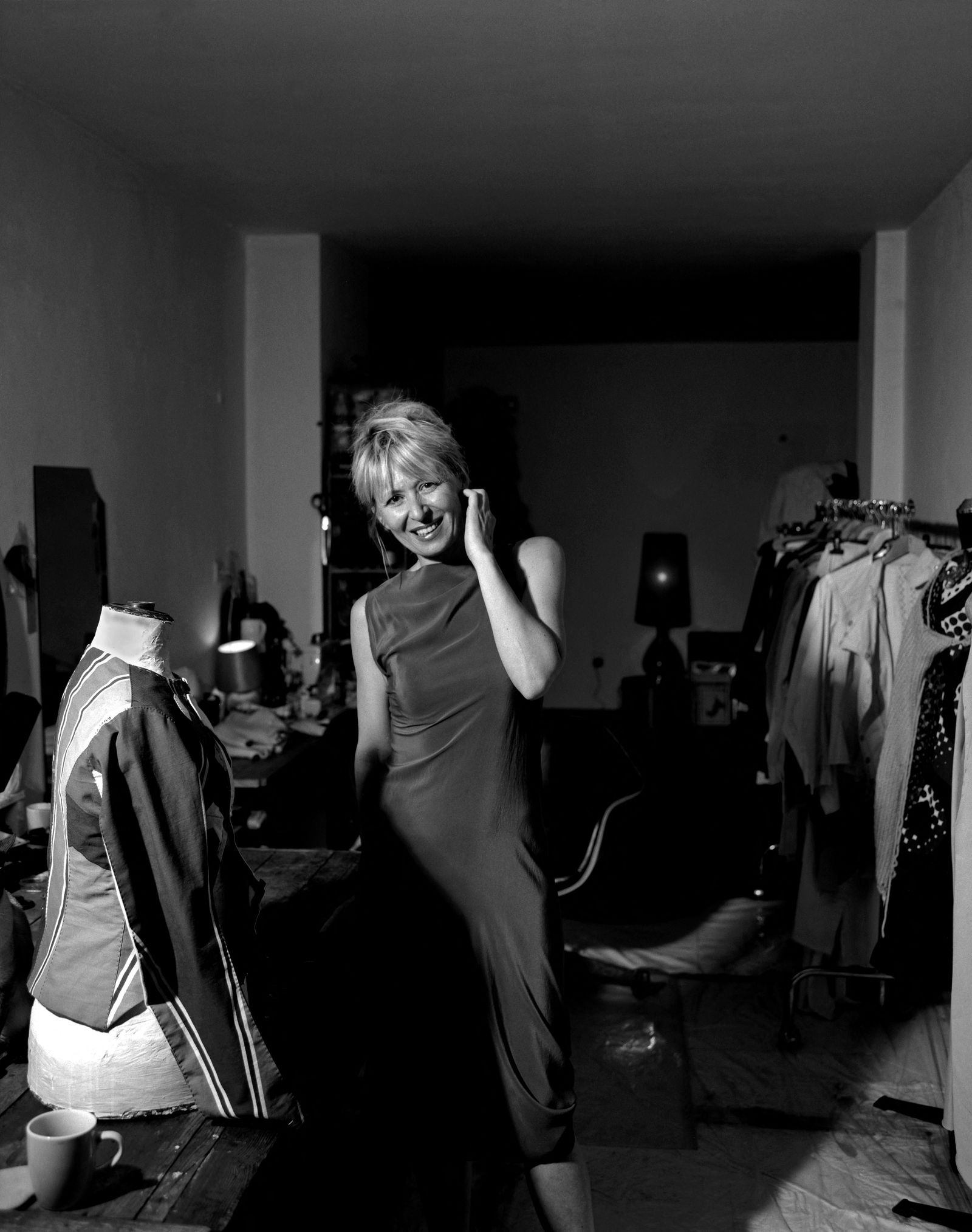 The image may contain dressing room interior photography, adult faces, avatars, clothing, dresses and cups