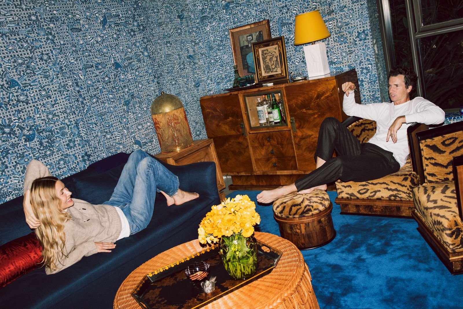 Images may contain sofas, furniture, people, food, food displays, clothing, jeans and pants