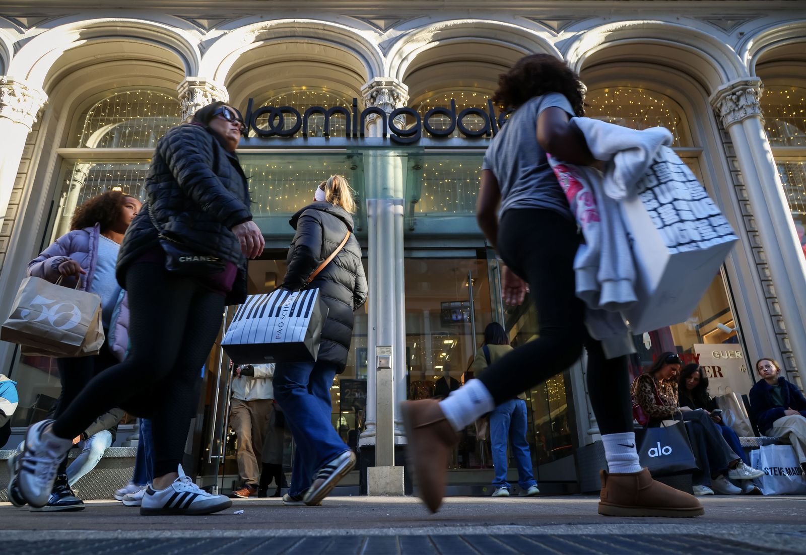 Image may contain adults, clothing, footwear, shoes, pants, accessories, bags, handbags and walking