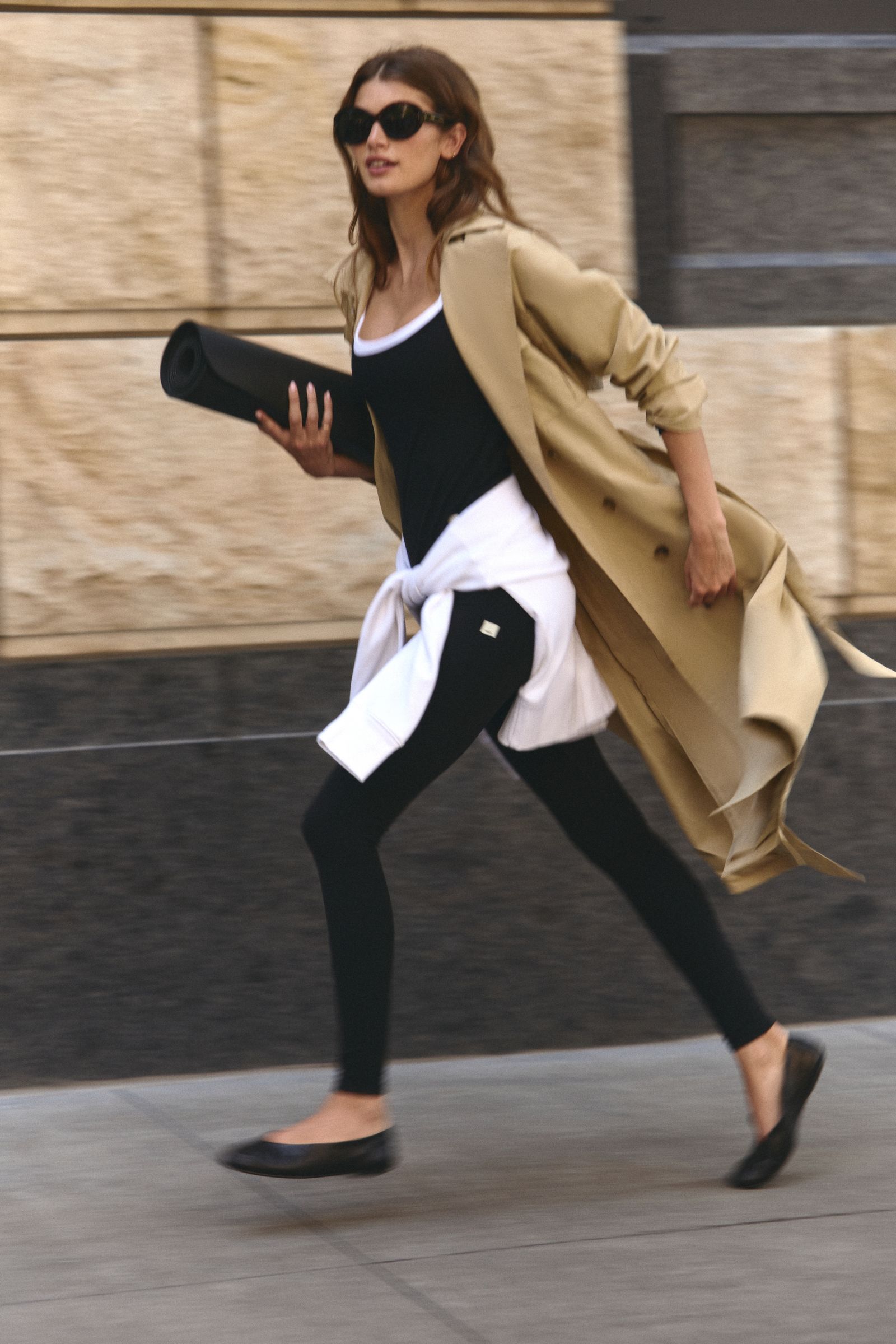 Picture may contain clothing, coats, shoes, shoes, high heels, blazers, people walking pants, adults and capes