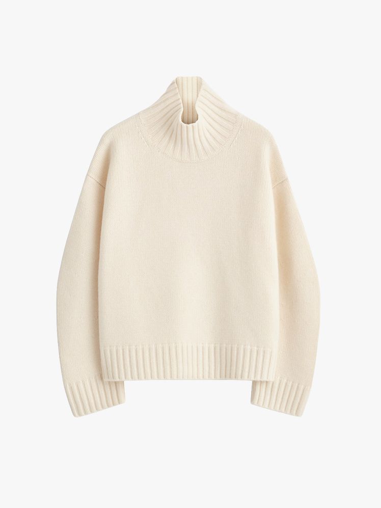 Image may contain: clothes, knitwear, sweaters, sweatshirts and hats