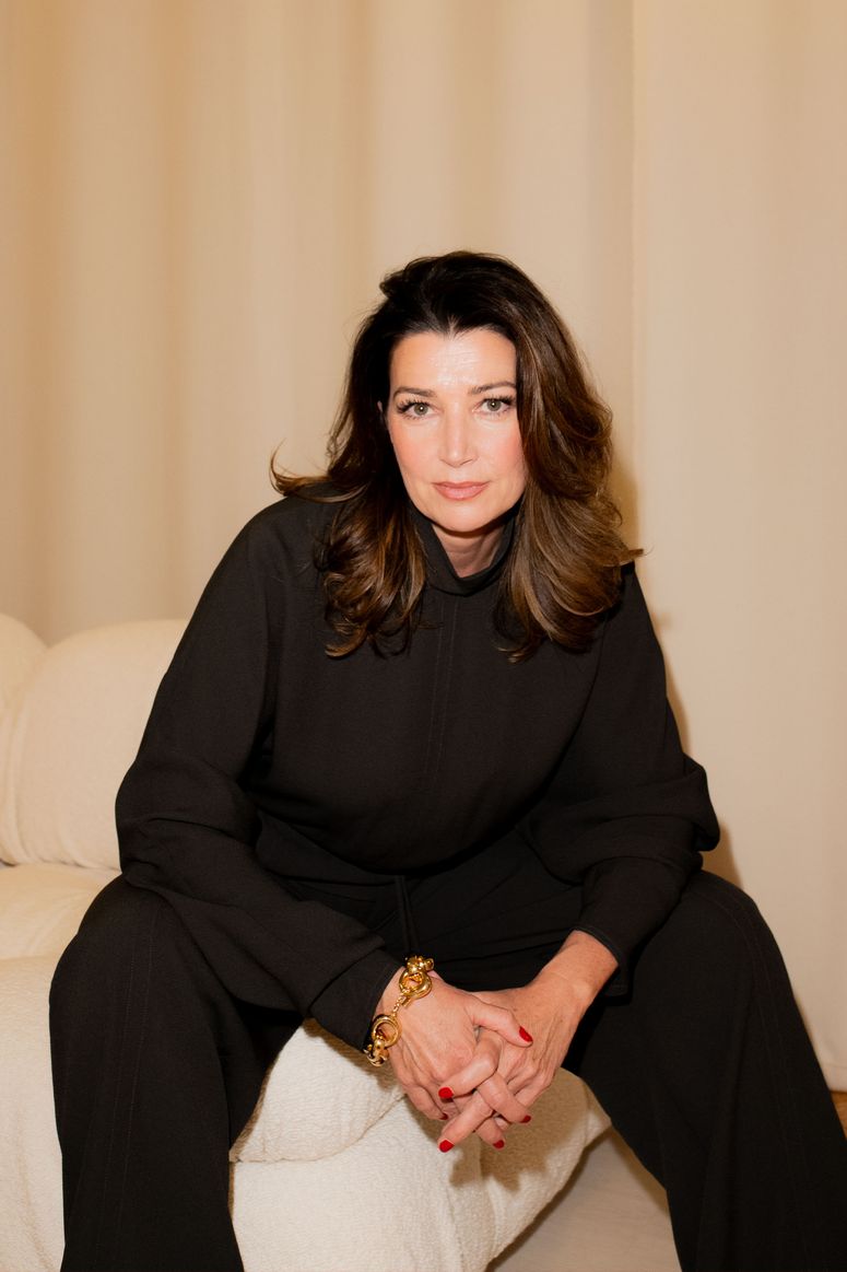 Image may contain: Amy Grant, adult, people, face, head, photography, portrait, body part, fingers, hands and accessories