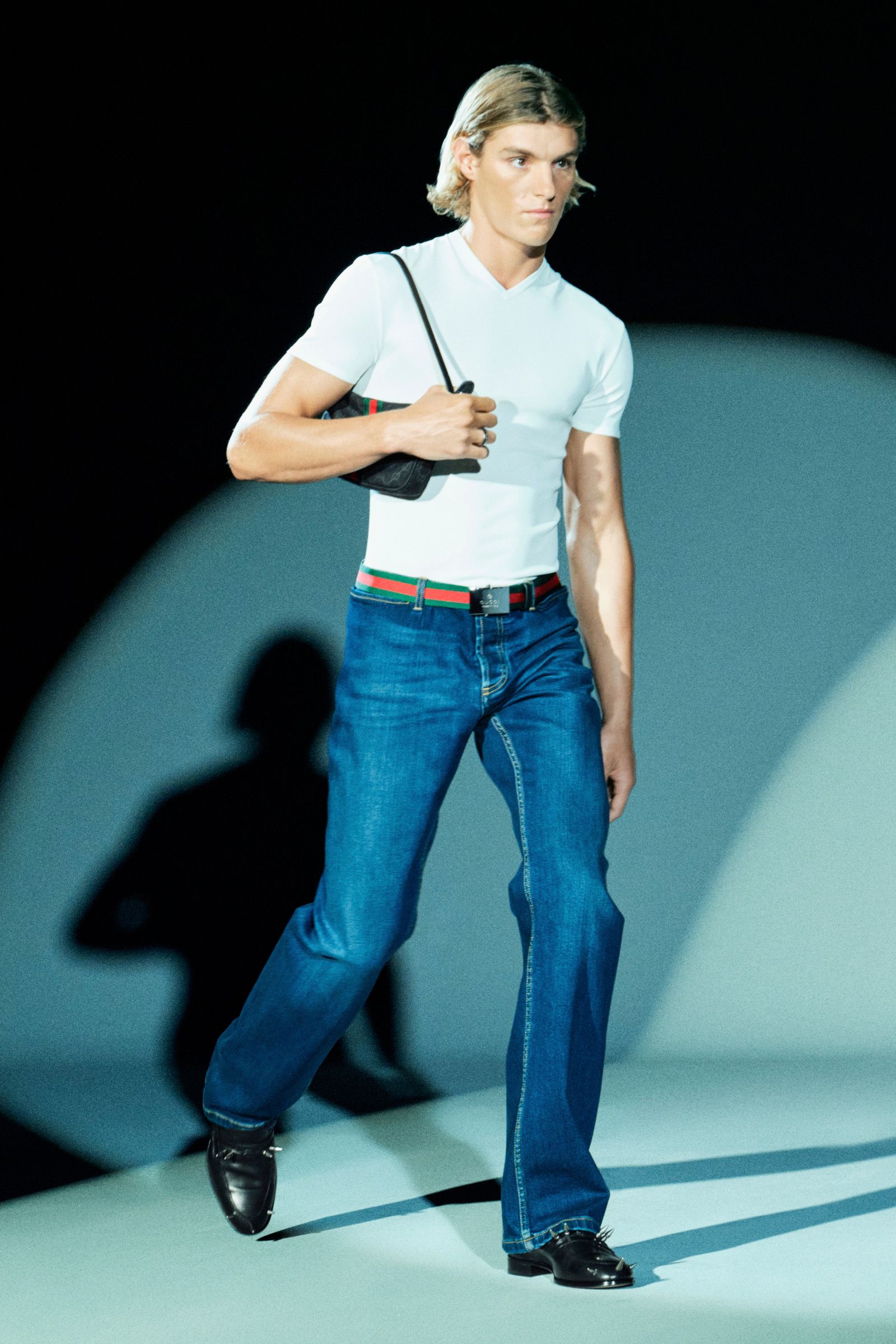 Image may contain clothing, pants, jeans, adult accessories, bags, handbags, footwear and shoes