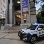 A Brazilian police car in front of the Mario de Andrade Public Library in São Paulo. Eight prints by French artist Henri Matisse and five prints by Brazilian modernist painter Candido Portinari, part of a library exhibition, were stolen by armed thieves on December 7