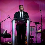 A black man stood at the podium.