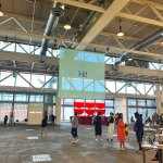 View of art fair with sign saying