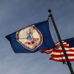 RICHMOND, VA - FEBRUARY 9: The Virginia state flag and the American flag fly near the Virginia State Capitol on February 9, 2019 in Richmond, Virginia. Virginia politics is in a state of upheaval, with Gov. Ralph Northam, state Attorney General Mark Herring (both Democrats) and Republican Senate Majority Leader Tommy Norment all implicated in past use of blackface, while Democratic Lt. Gov. Justin Fairfax has been accused by two women of sexual misconduct. (Photo by Drew Angler/Getty Images)