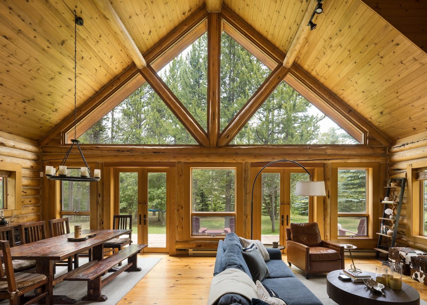 Images may contain wood, hardwood, stained wood, interior design, chairs, furniture, benches, sofas and architecture