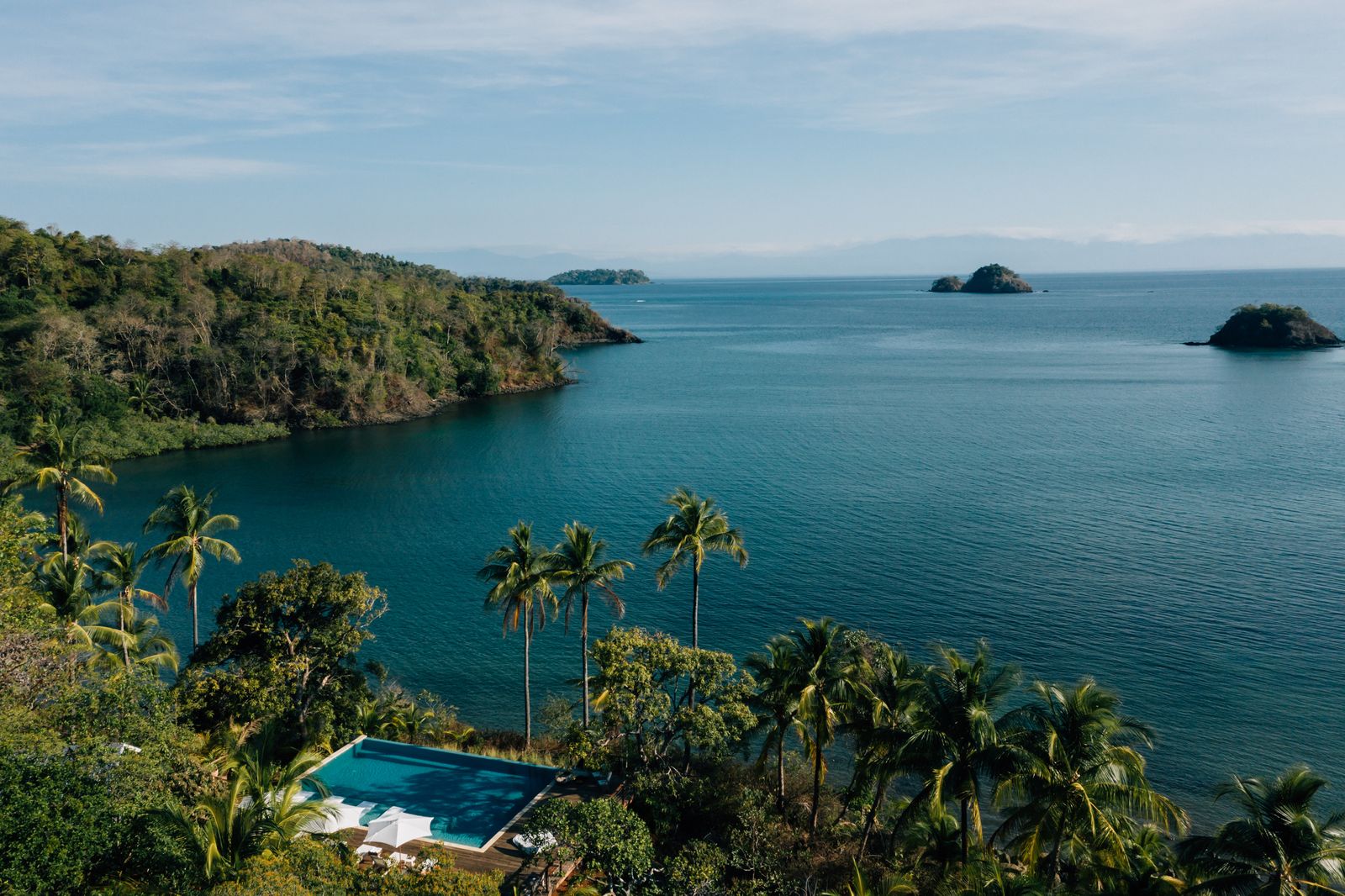 Pictures may contain outdoor natural sea water swimming pool coast coastline aerial view plants and vegetation