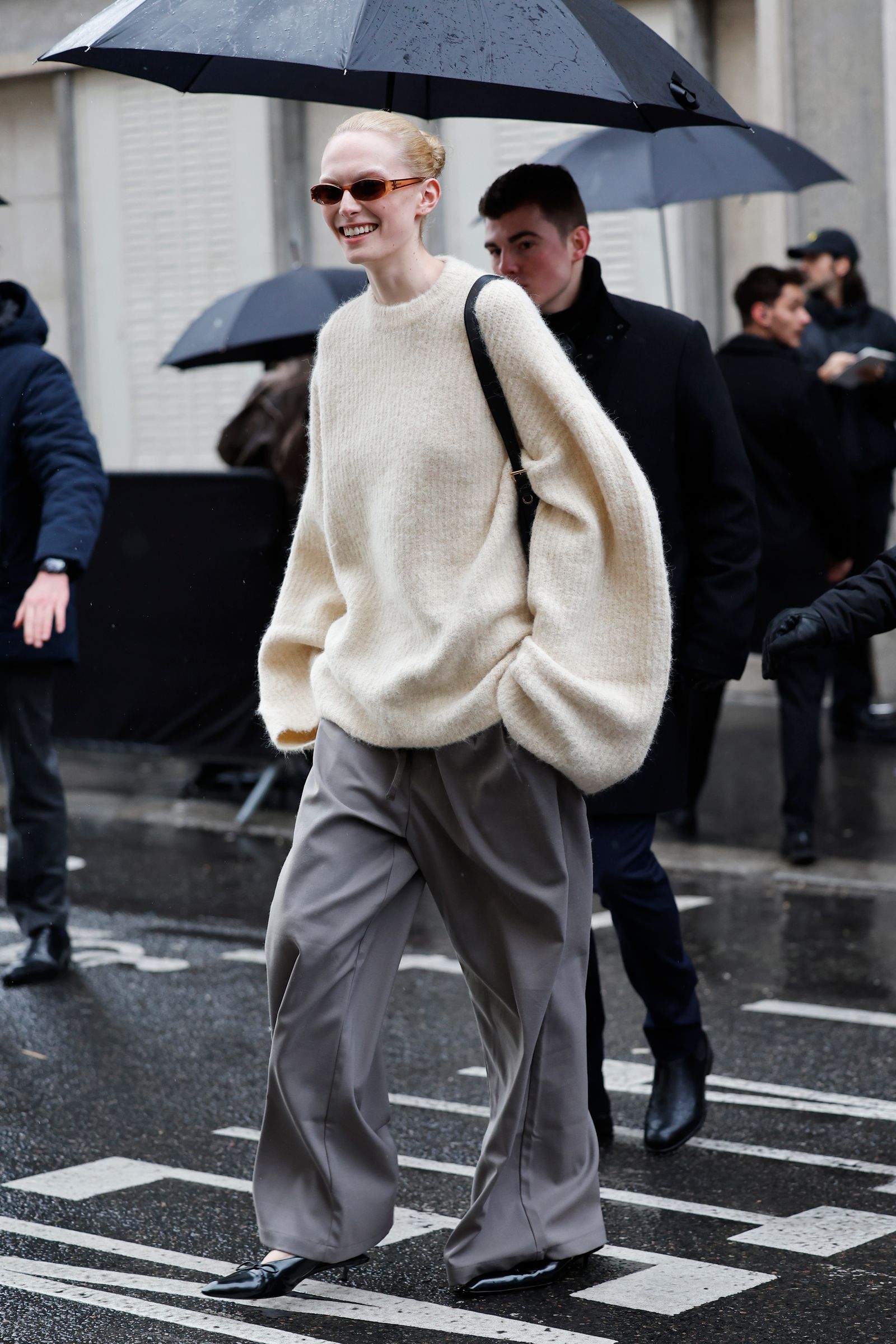 Image may contain Nick Matthew people walking pedestrians adult clothing gloves sweaters sweaters hats and coats