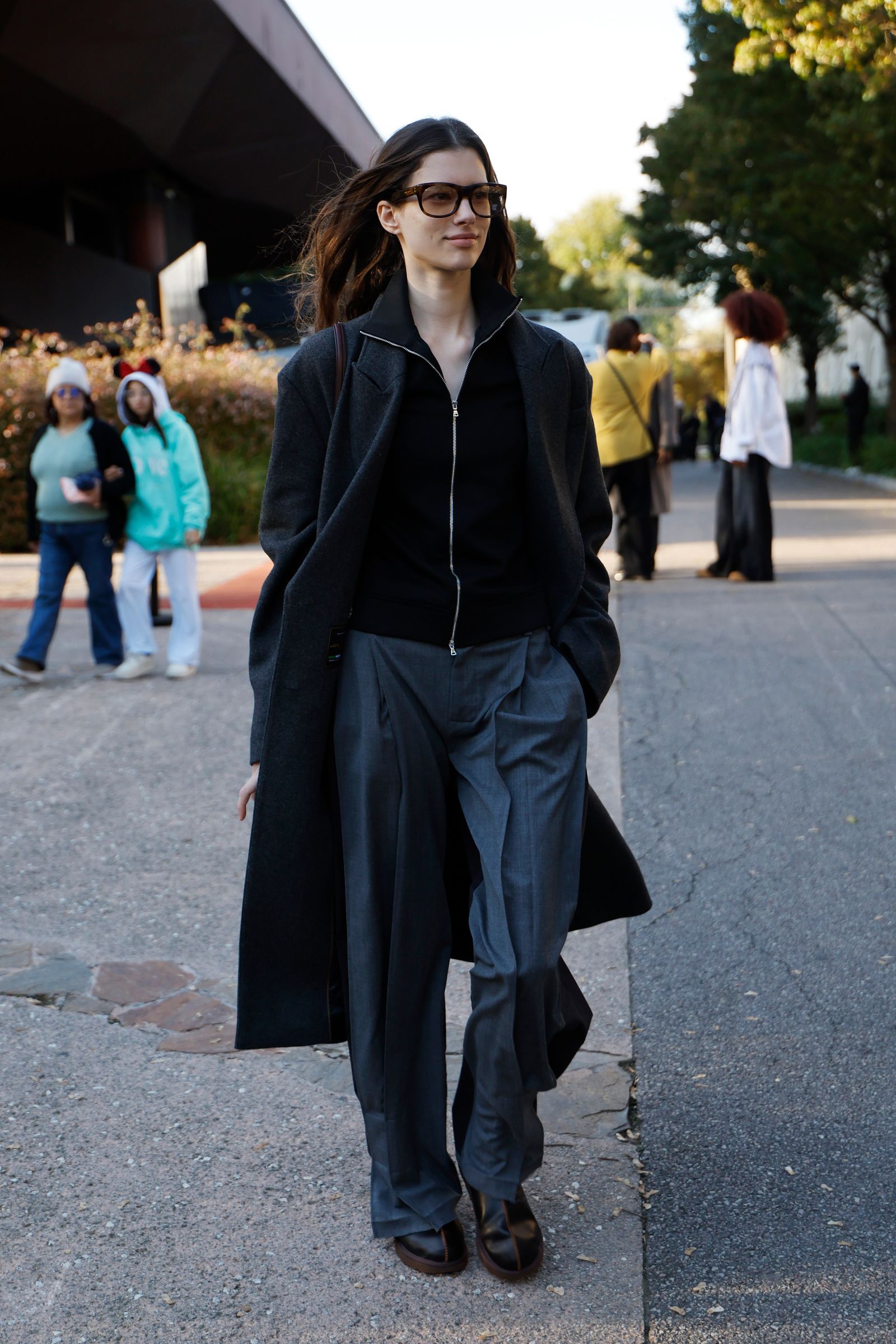 Image may contain clothing, coats, pants, walking jackets, pedestrian adults and blazers