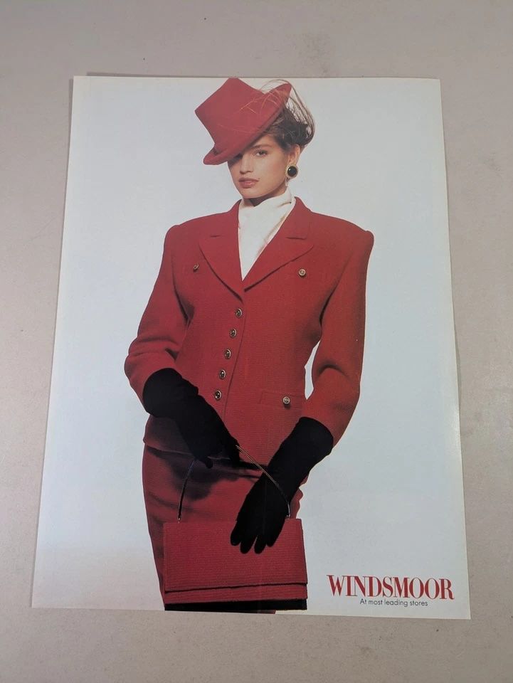 Image may contain Cindy Crawford Clothing Coats Formal Suits Gloves Adult Blazers Jackets and Dresses