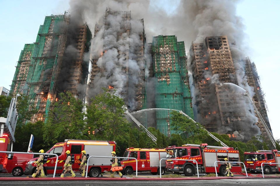 At least 4 killed in Hong Kong high-rise apartment building fire