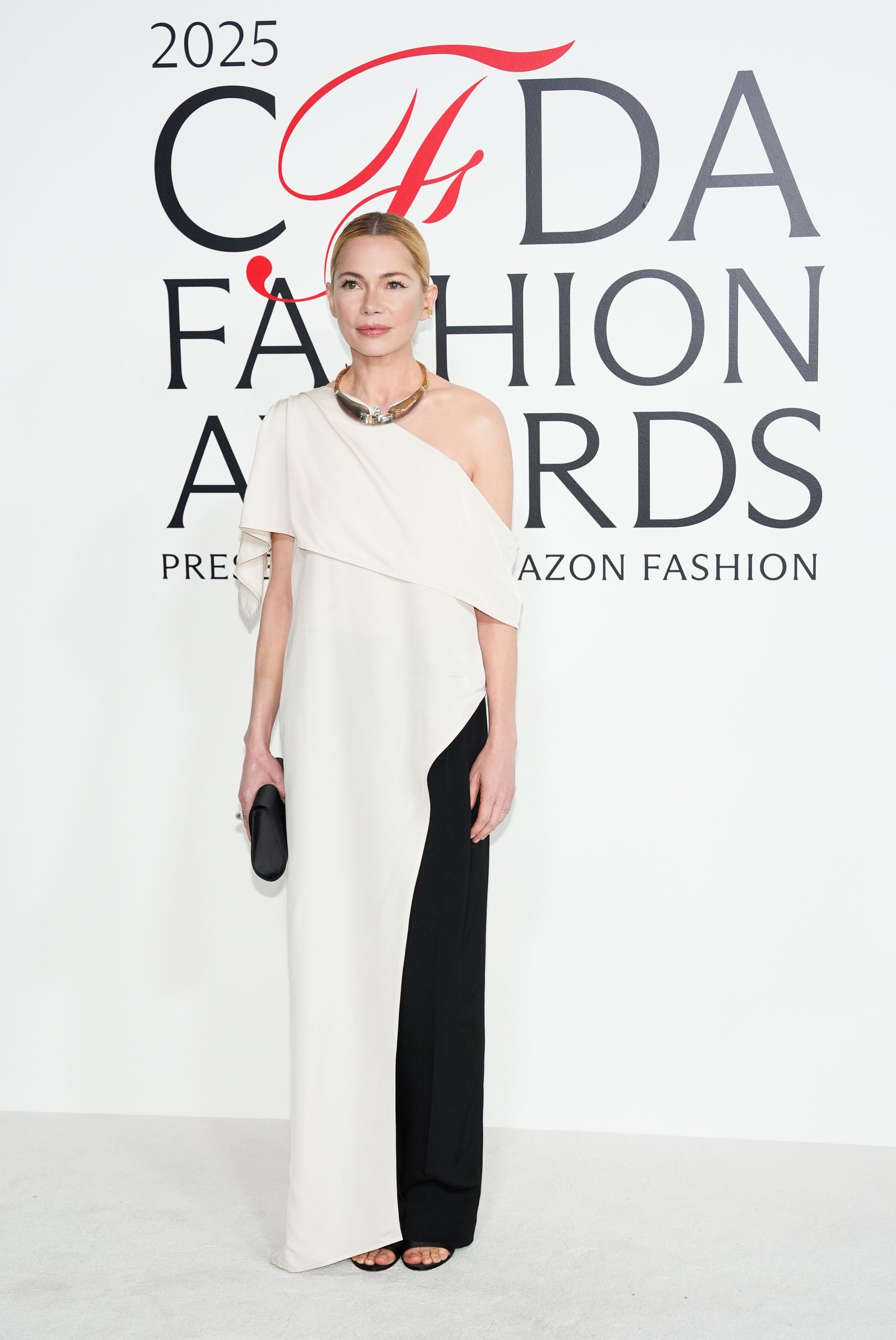 Images may contain Michelle Williams adult apparel, dresses, fashion publications, formal wear and accessories