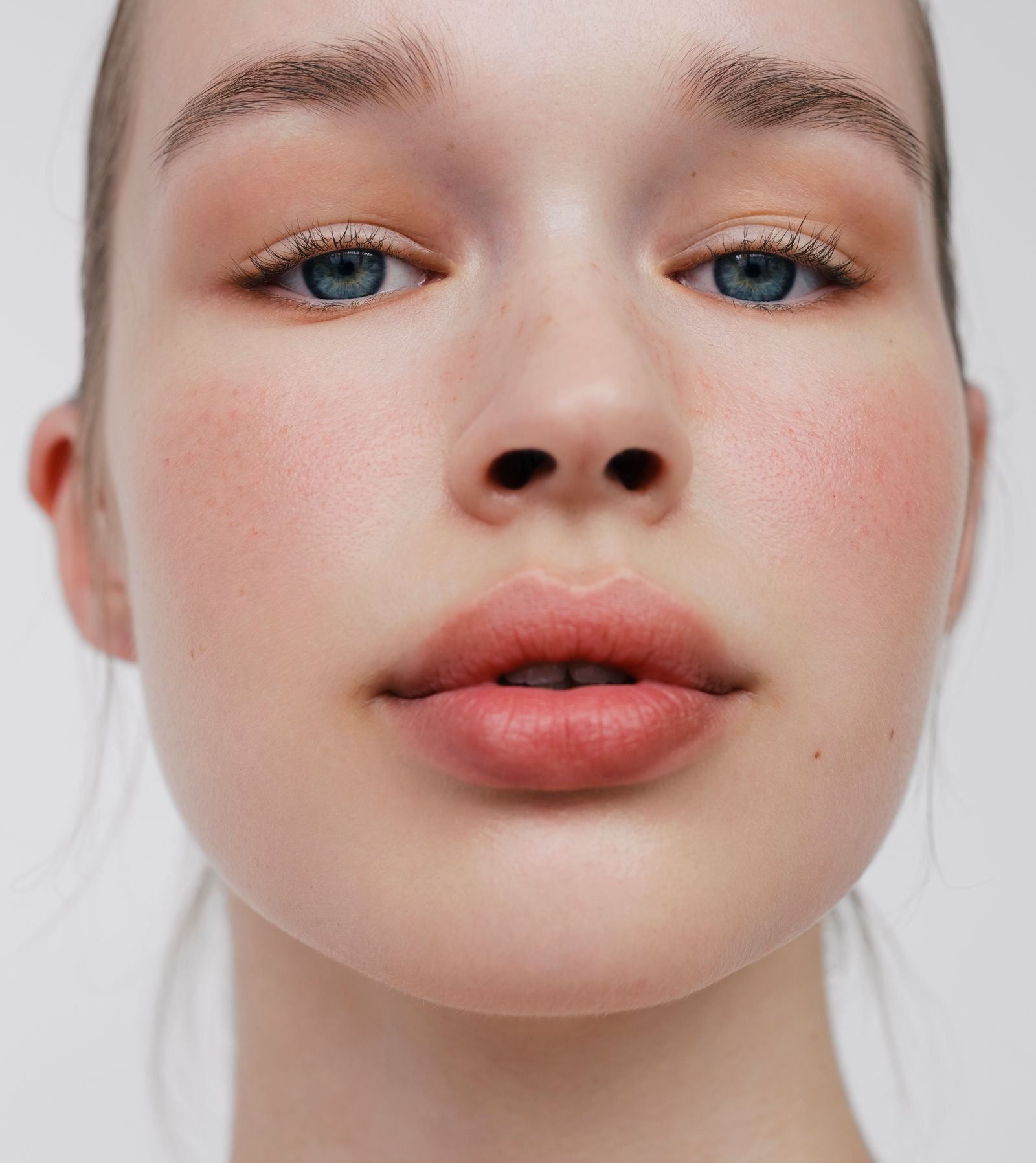 Image may contain people, skin, baby heads and faces