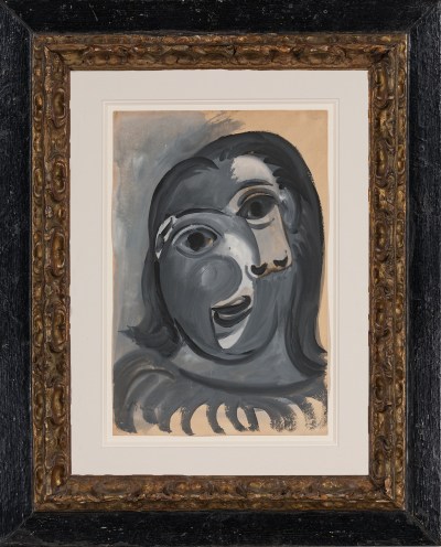 Stylized artwork by Pablo Picasso showing the head and shoulders of a young woman
