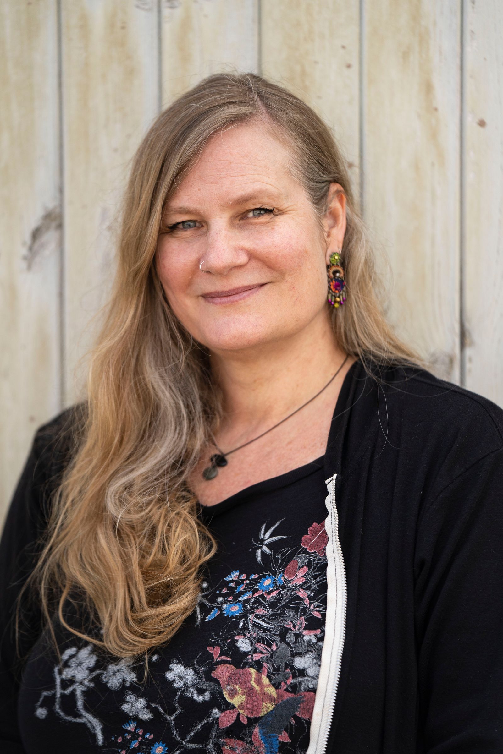 Image may contain Lidia Yuknavitch Blonde Hair Person Adult Brown Hair Body Part Face Head Neck and Photography