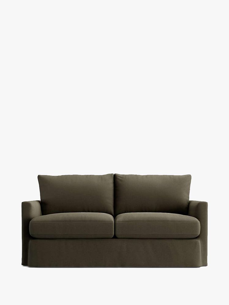 Image may contain: sofa, furniture, cushions, home decor and pillows