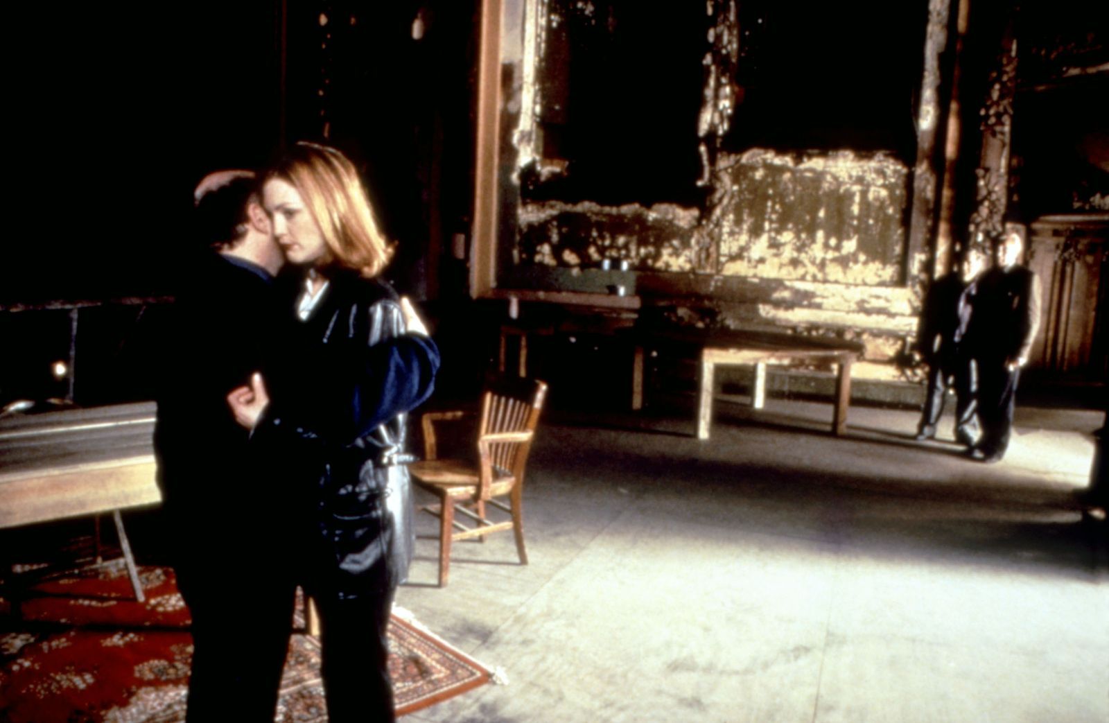 Image may contain furniture, chairs, people, restaurant, clothing, clothing and table